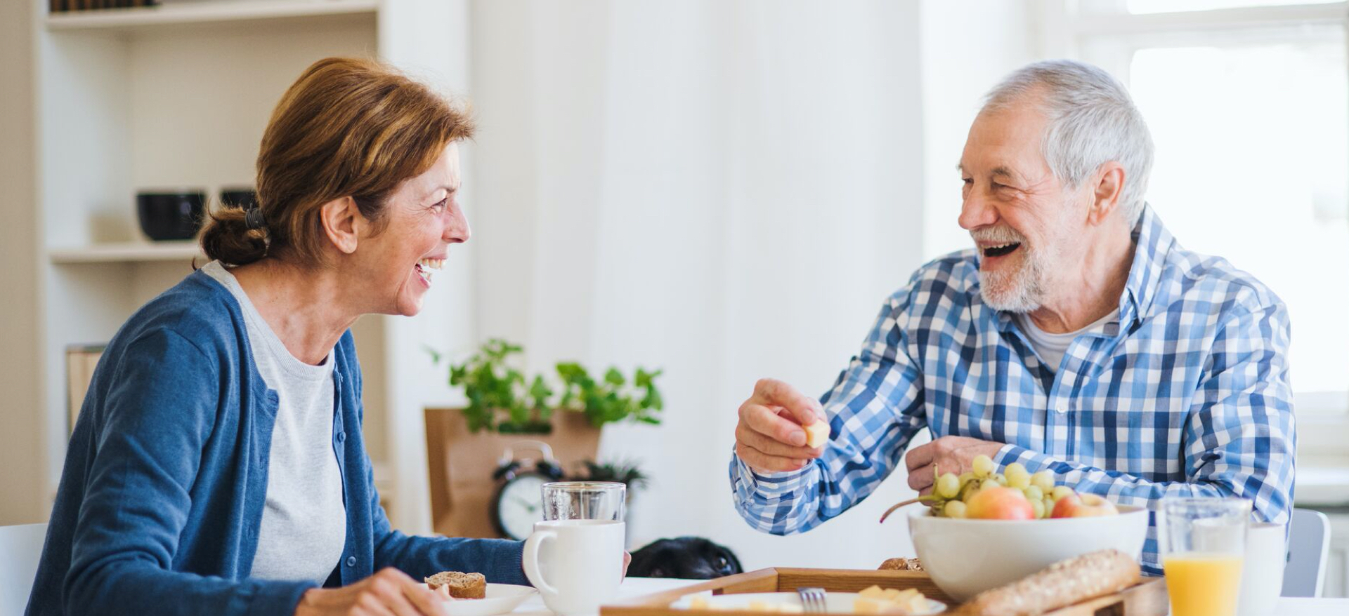 senior couple enjoying breakfast together